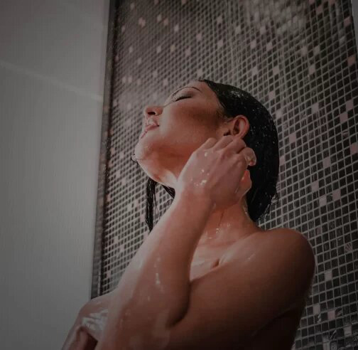 Woman Taking A Shower
